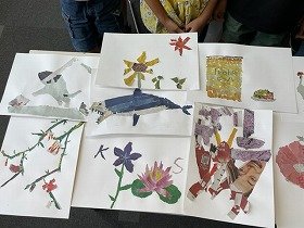 画像：完成した桔梗の花やサメなどの新聞ちぎり絵