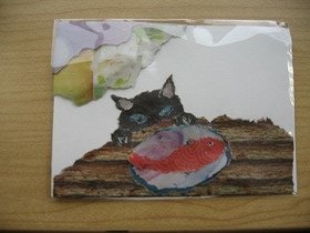 画像：完成したネコと魚のちぎり絵。