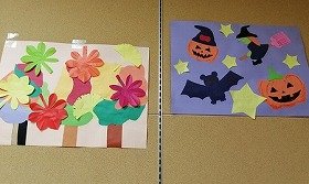 折り紙で作られた木々の飾りと、ハロウィンの魔女やかぼちゃのおばけの飾り