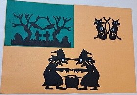 切り絵などによるハロウィンがテーマの壁面装飾。