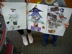 写真2　完成した作品を持っている子どもの写真。