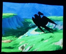 写真2 　影絵「おやゆびひめ」の一場面。